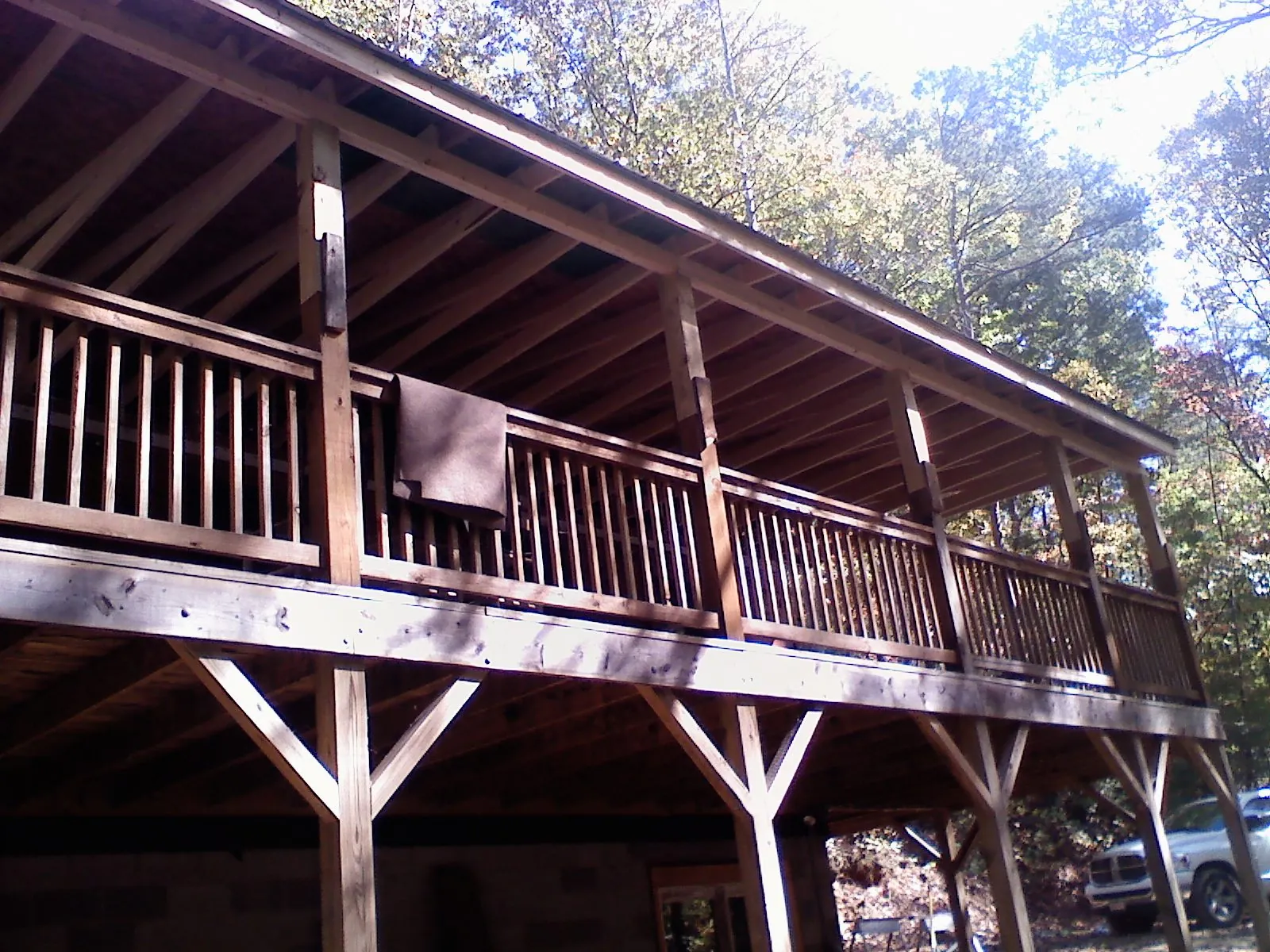 Timber framing under a new elevated porch and deck — Roof Leak Repair in Poncha Springs by Roofing Brothers